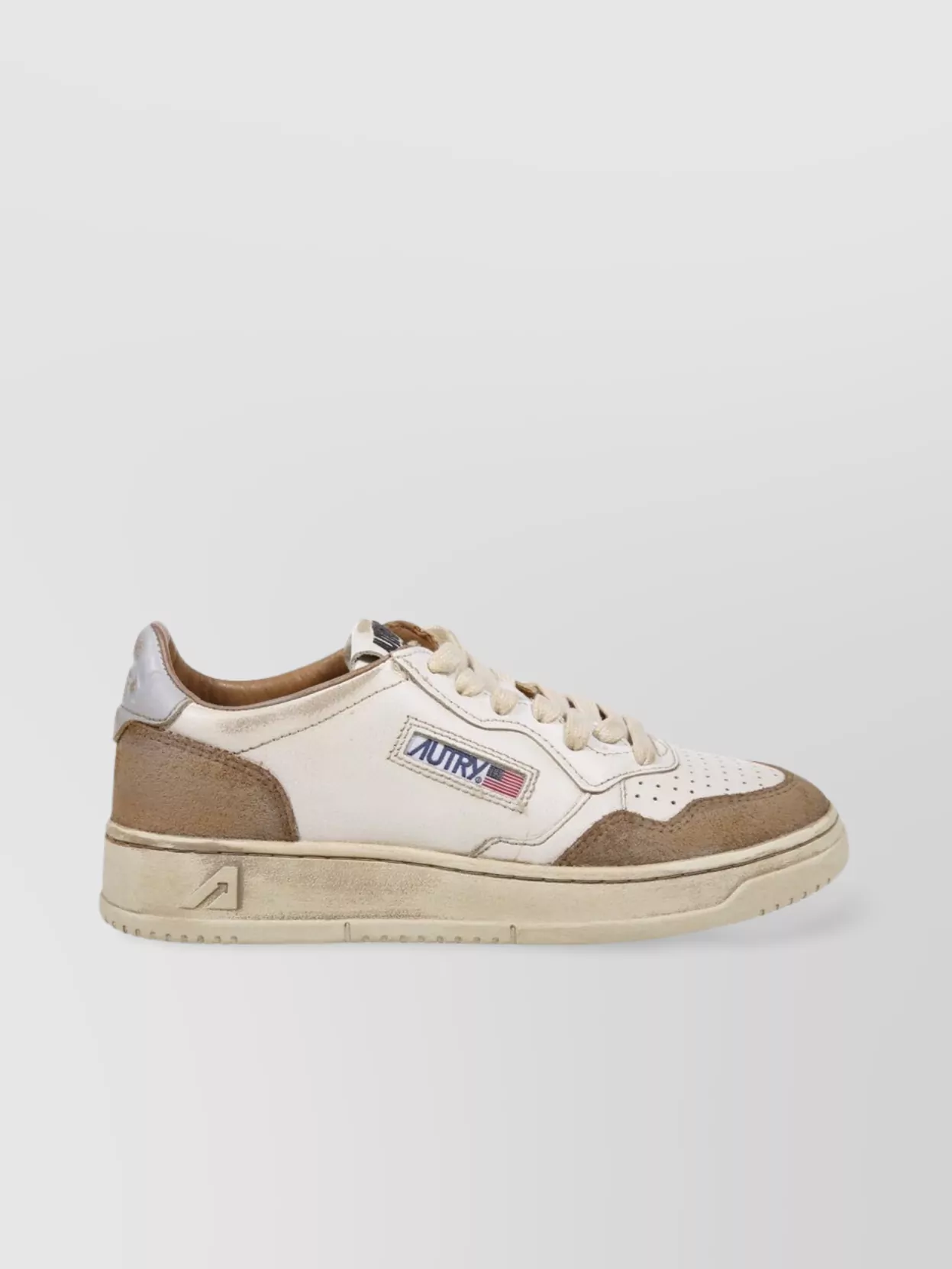 Autry Low Sneaker With Perforated Detailing And Contrast Panel