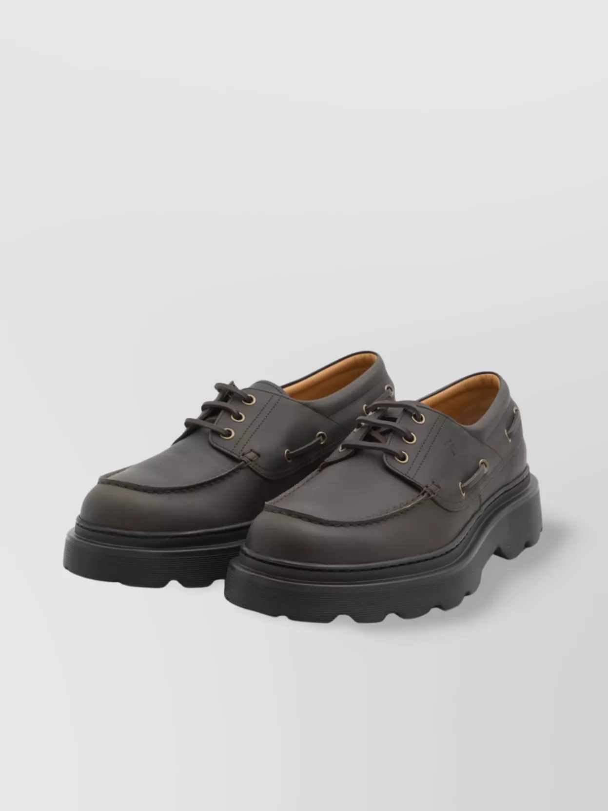 Tod's Boat Shoe With Tank Tread Sole