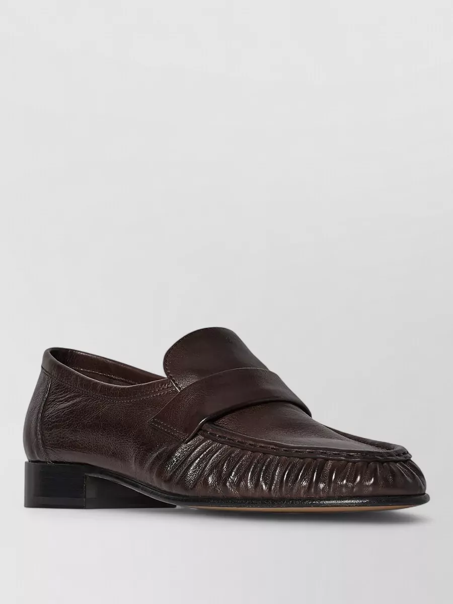 The Row leather mules