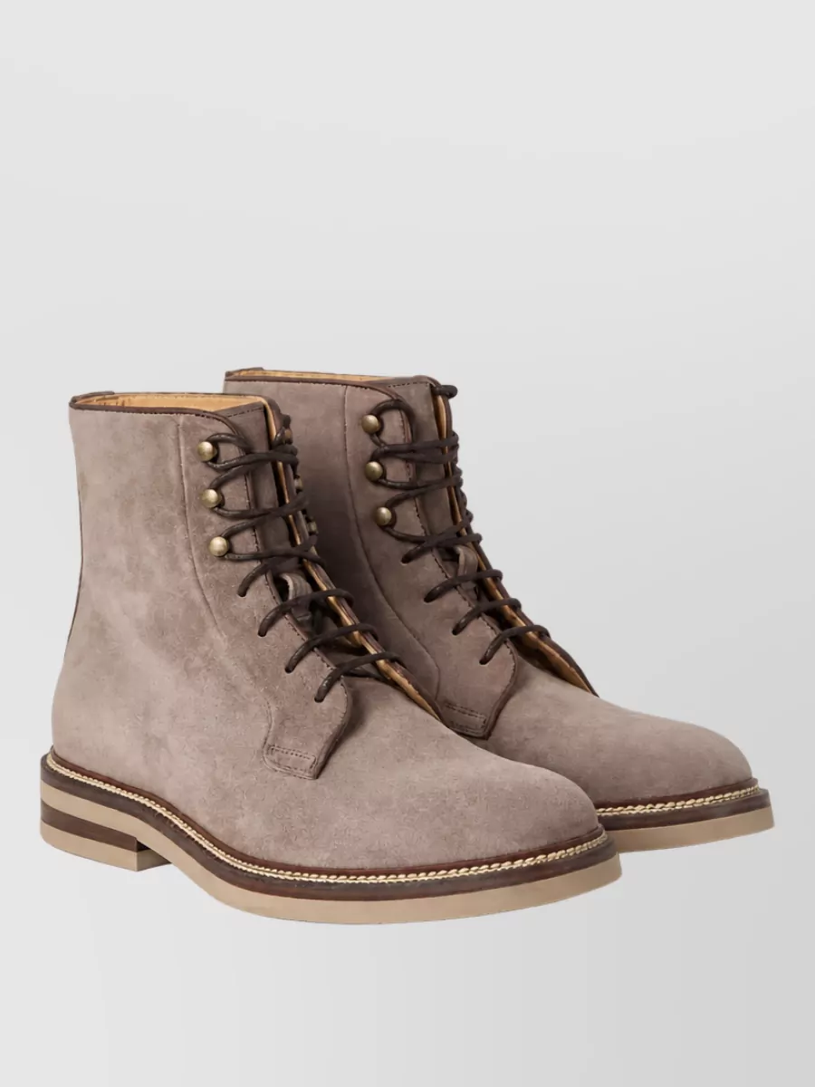 Brunello Cucinelli Suede leather boots — The taupe suede Chelsea boot is refined yet relaxed, its warm neutral grounding the navy and charcoal tones without adding visual weight.