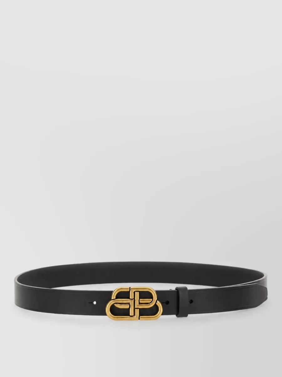 Balenciaga Leather bb thin belt — The slim black belt with subtle gold hardware can sit neatly at the trouser’s high waist, lightly defining the midsection without distracting from the top’s sculpted shape.