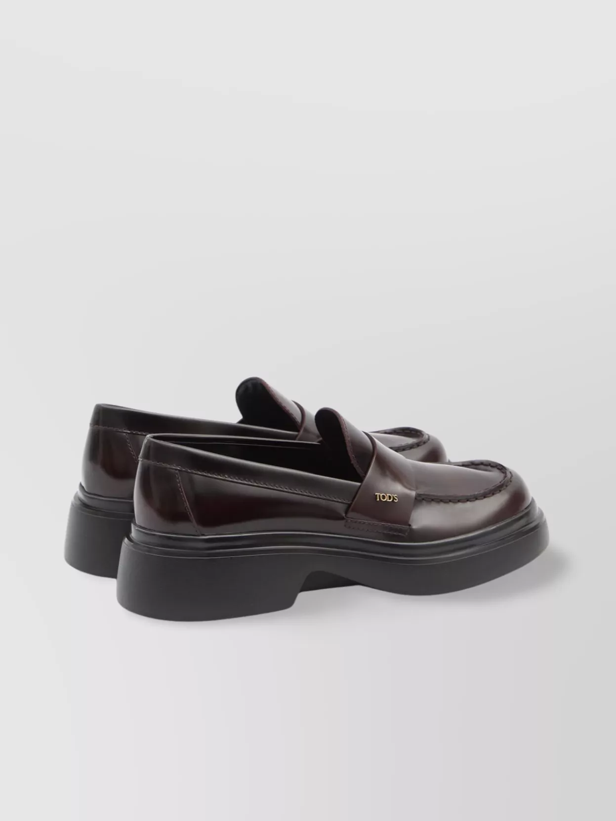 Tod's Logo Plaque Glossy Leather Loafers In Burgundy