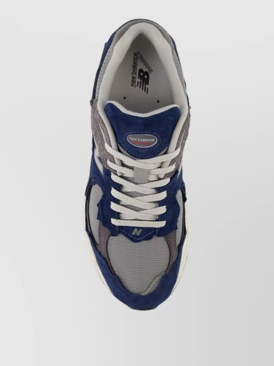 New Balance Paneled Low-Top Sneakers