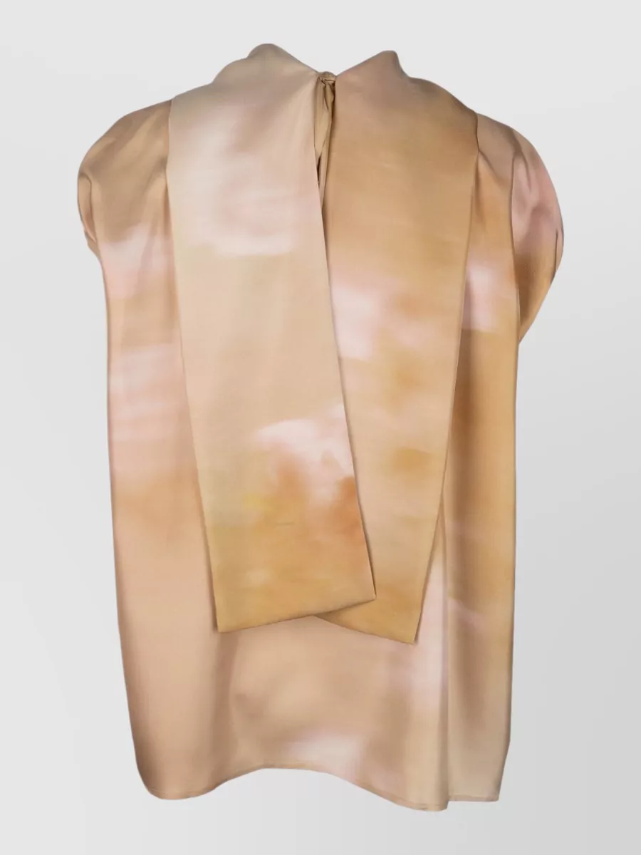 Fabiana Filippi Silk short-sleeve blouse — The softly blurred sand and blush scarf-top mirrors the trouser’s hue and fluidity, creating a tonal, romantic column that stays within Fabiana Filippi’s quiet luxury mood while feeling special.