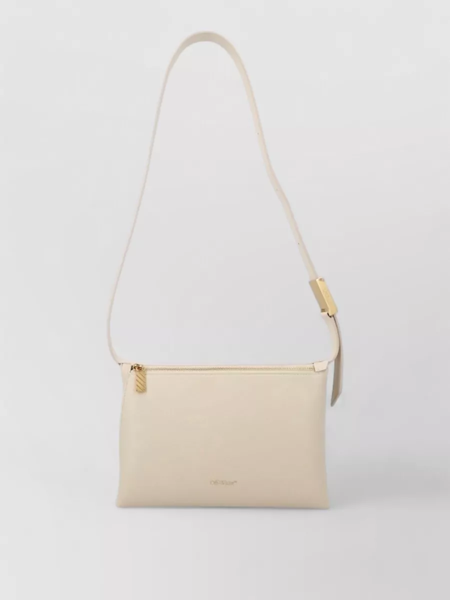 Off-White Calf leather cross-body bag — The sculpted black crescent shoulder bag echoes the black sandal and adds a clean, architectural counterpoint to the white column, maintaining quiet luxury while slightly sharpening the look.