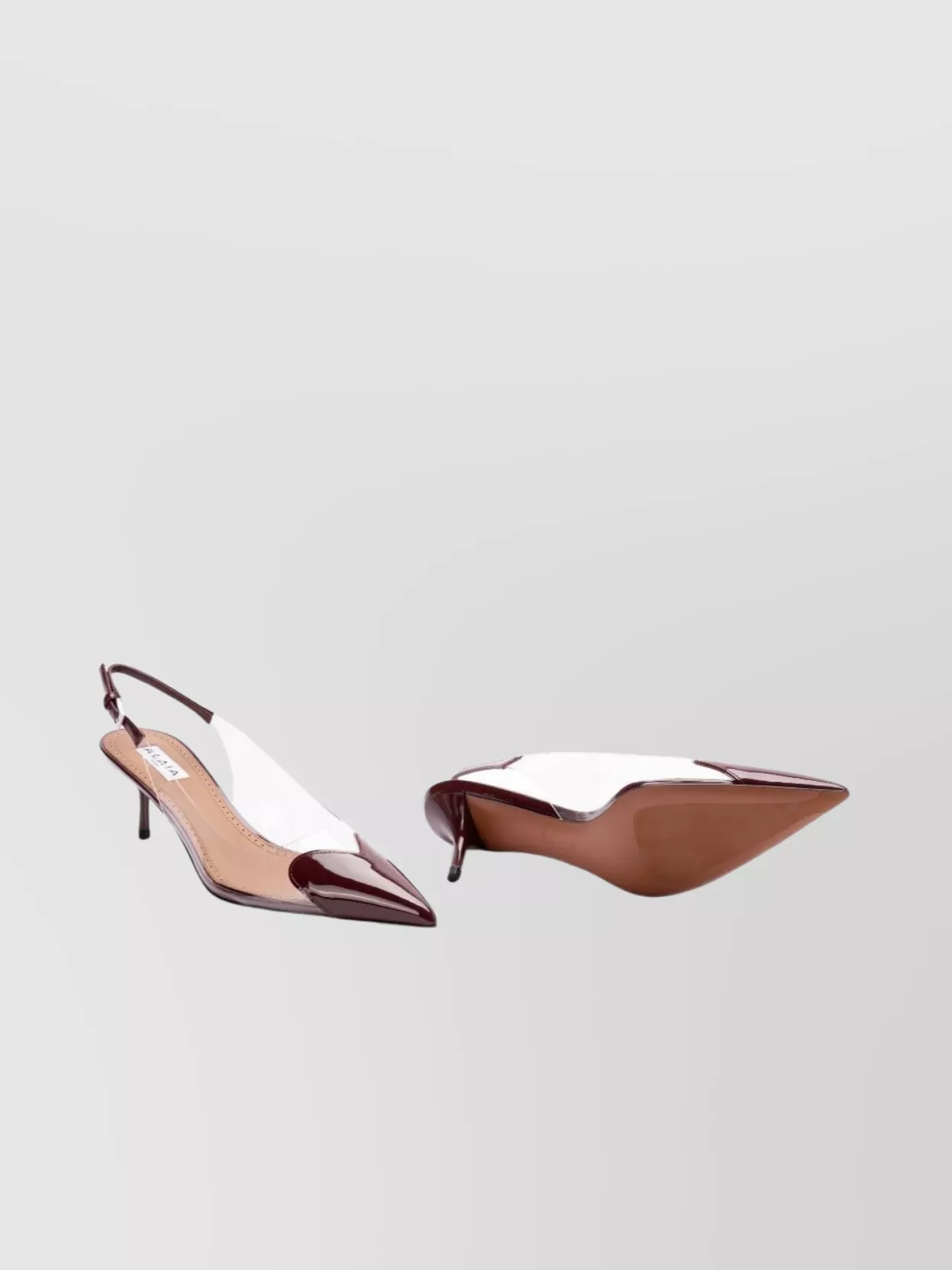 Alaïa Heart Slingbacks In Patent Leather