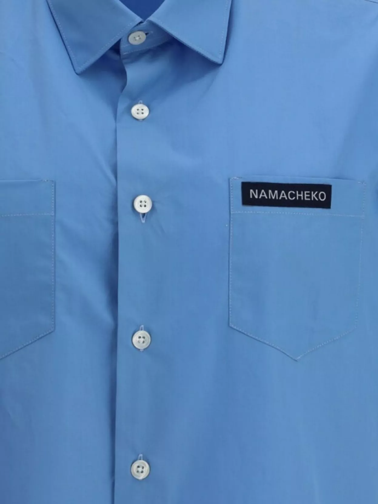 Namacheko Modern Asymmetric Hem Shirt With Patch Pockets