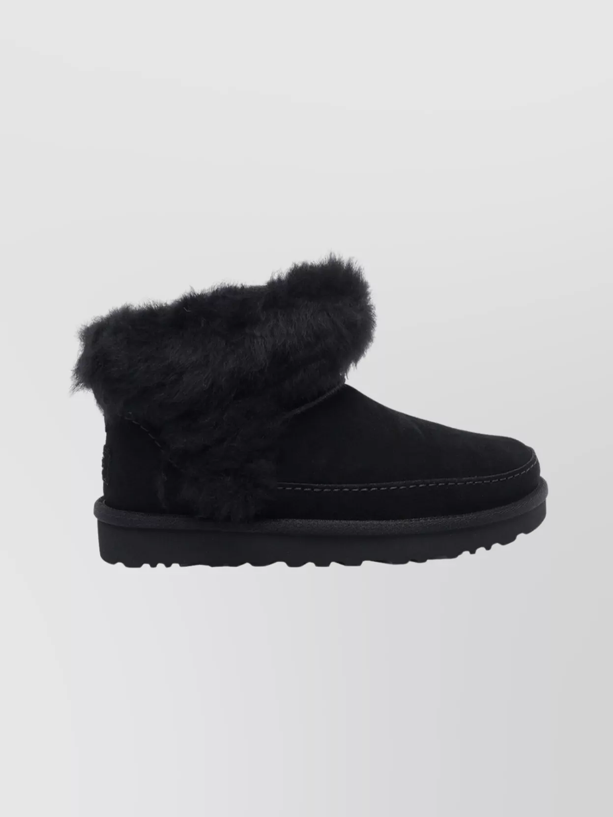 Ugg Stylish Ankle Boots Featuring Fur Trim