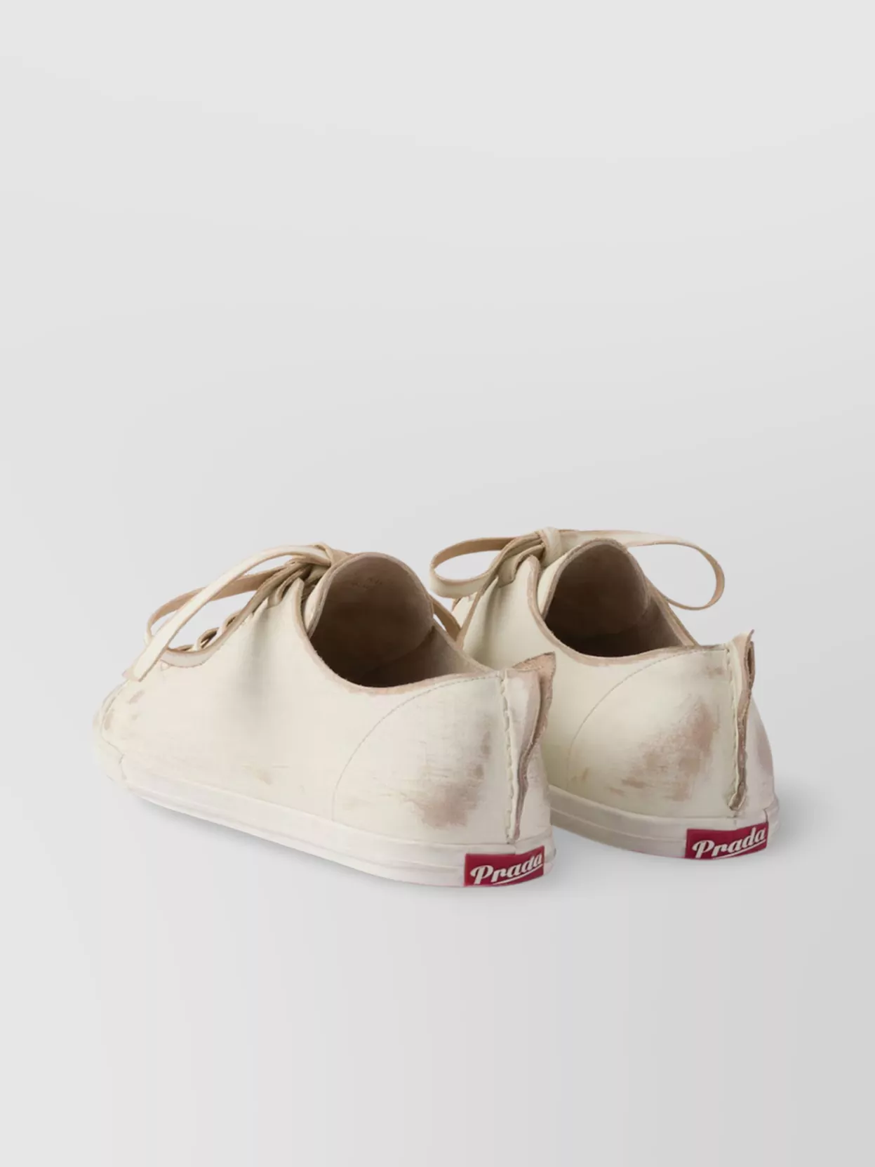 Prada Lace-Up Distressed Low-Top Sneakers