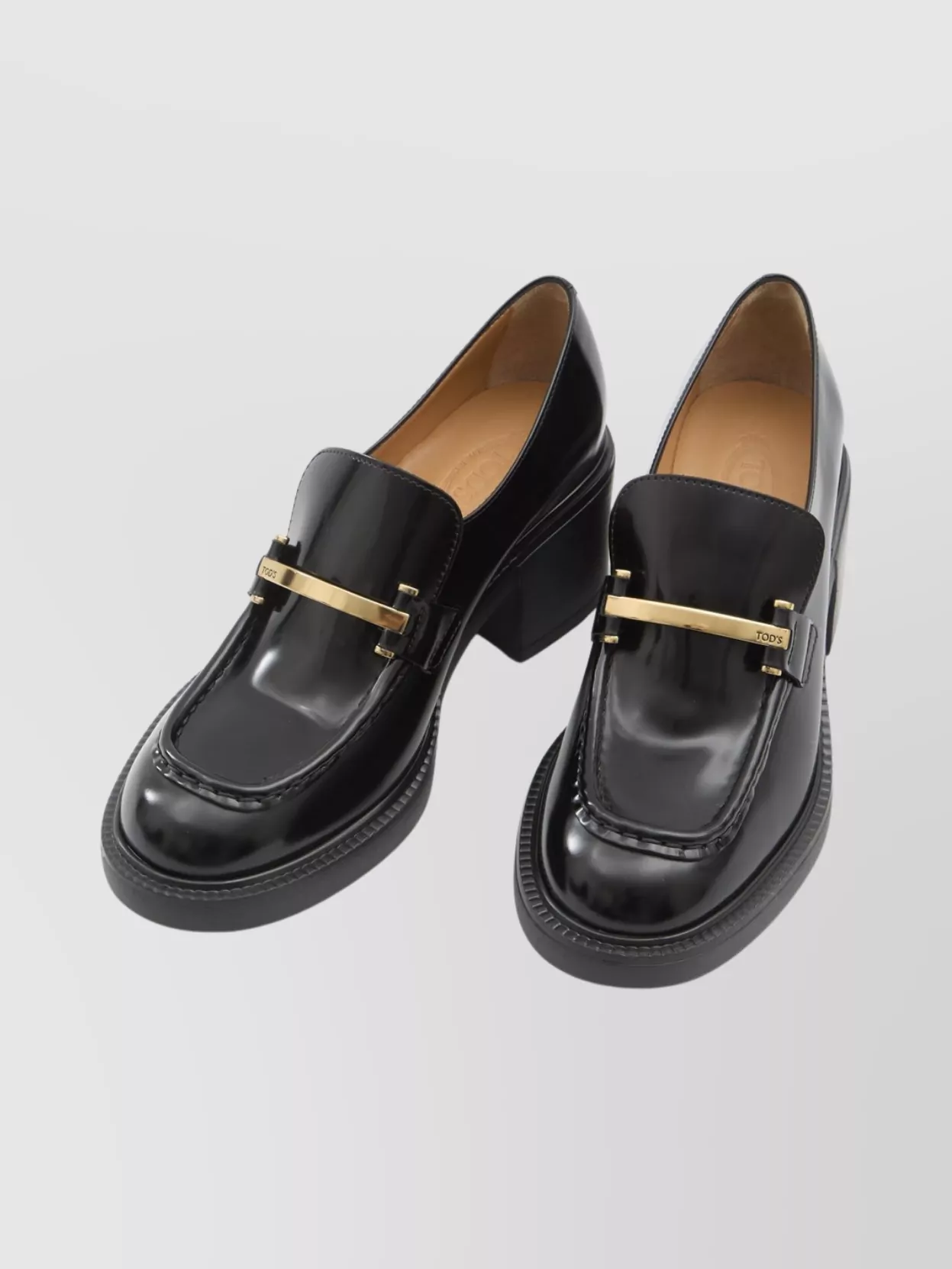 Tod's Leather Block Heel Loafer With Metal Detail