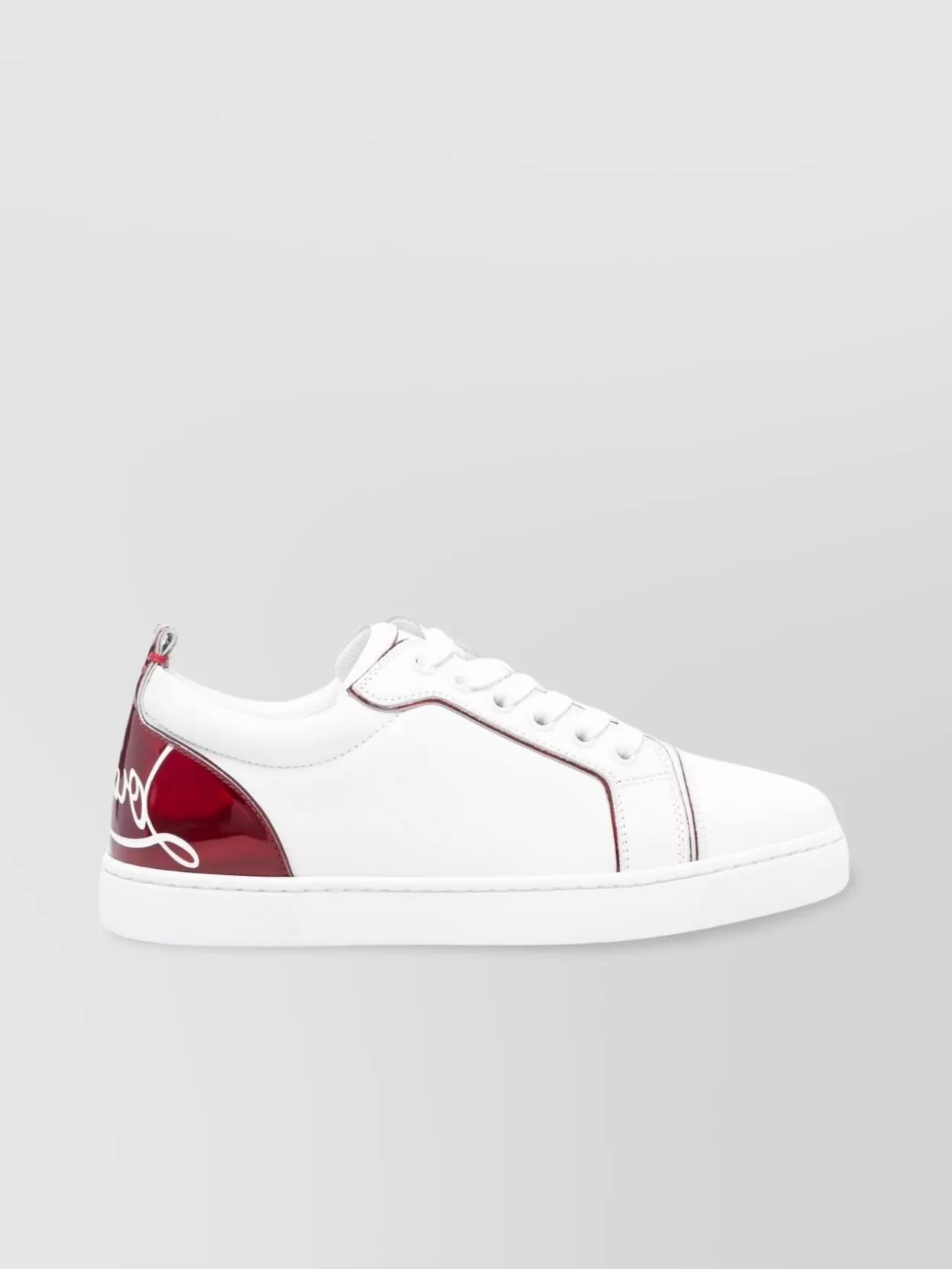 Christian Louboutin Round Toe Low Top Sneakers With Red Sole