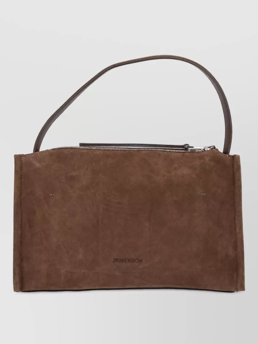 JW Anderson leather clutch bag