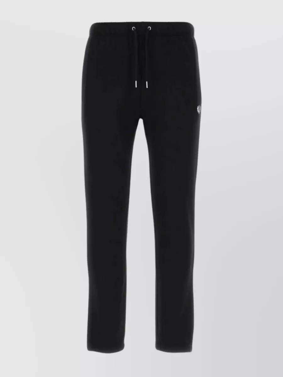 Shop Fred Perry Cotton Hemline Cuffed Trousers In Black