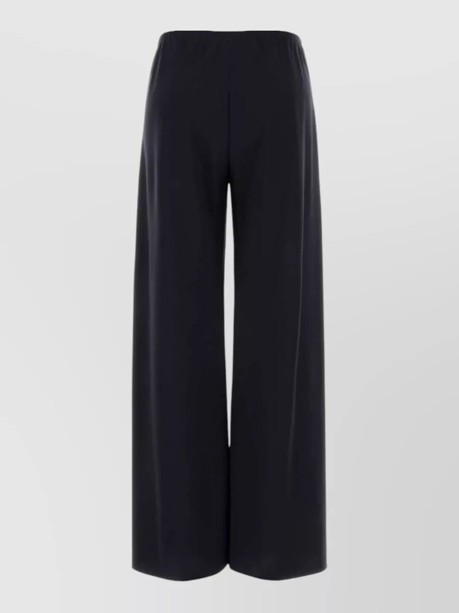The Row Flared Wide-Leg Trousers