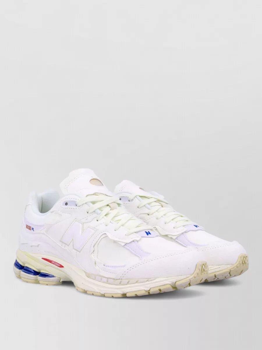 New Balance Suede Low-Top Sneakers