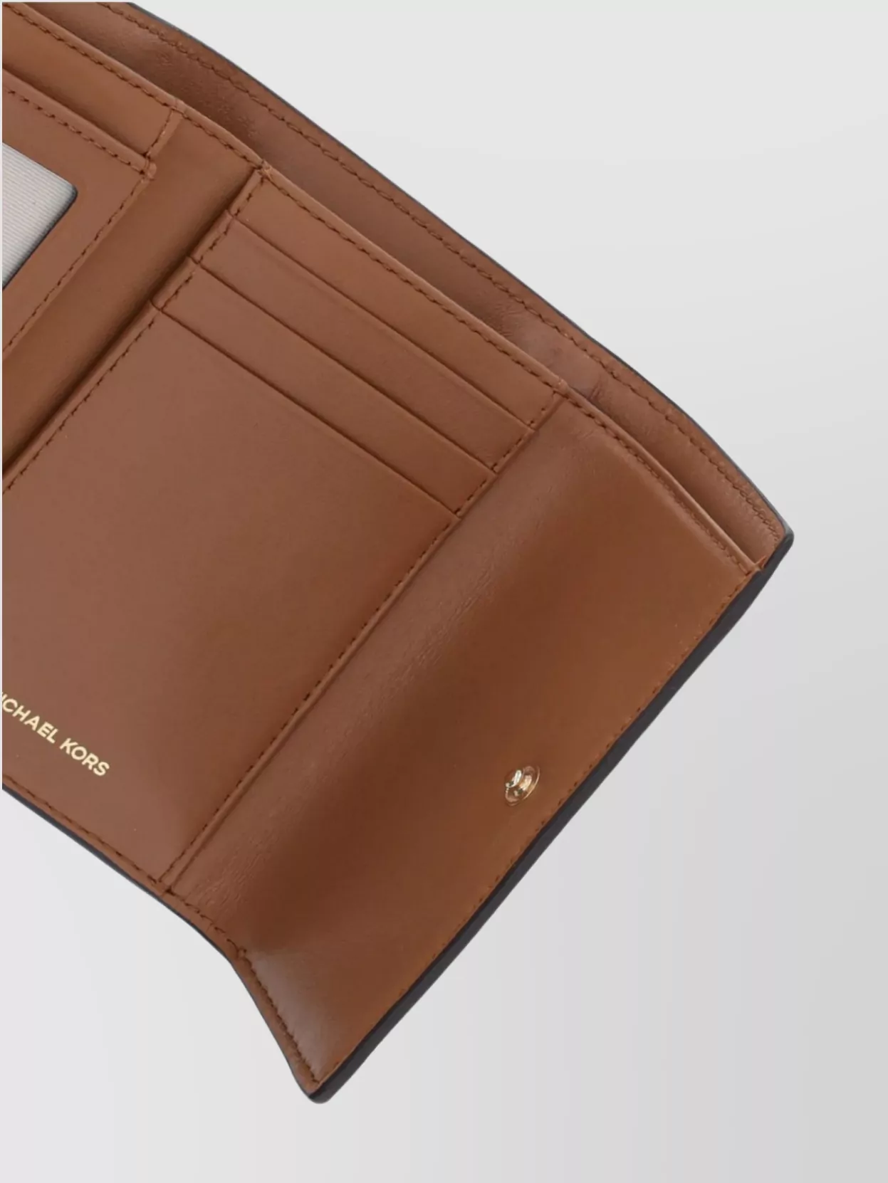Michael Kors Logo Pattern Wallet With Card Slots And Zip In Brown