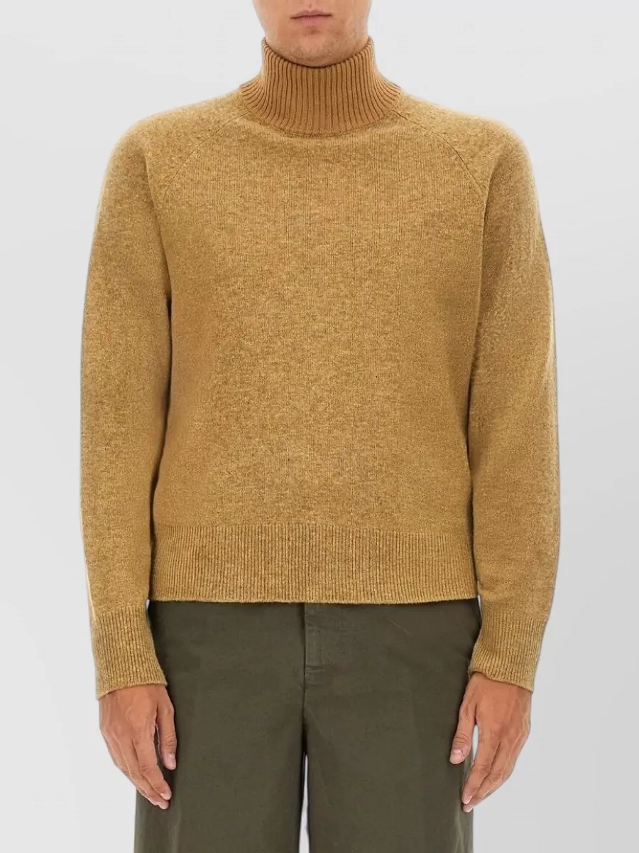 Dries Van Noten Slim-fit jumper — The camel turtleneck in L echoes the coat’s warm brown and quiet tailoring while keeping a softer knit layer under the structured high collar, which is more harmonious than stacking another blazer.