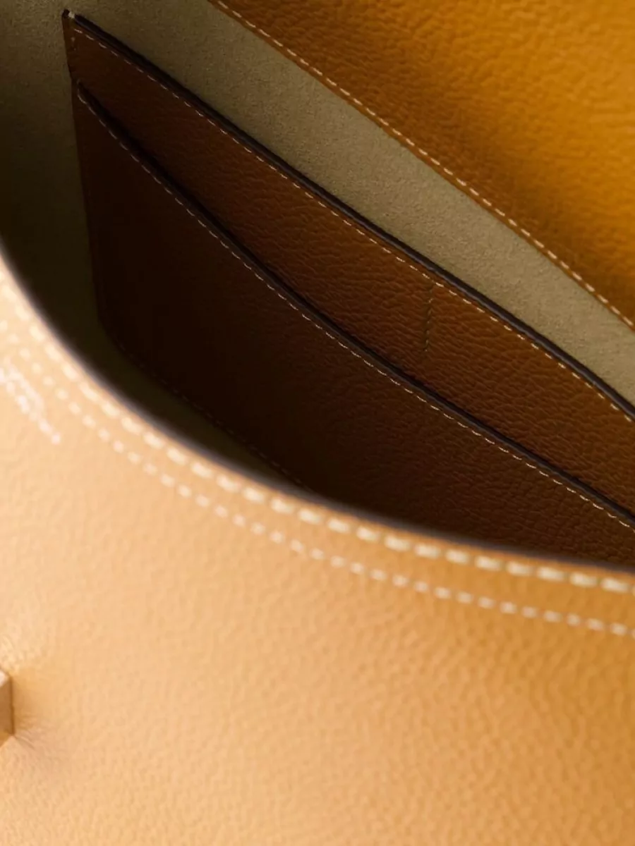 Totême Leather T-Lock Clutch Bag