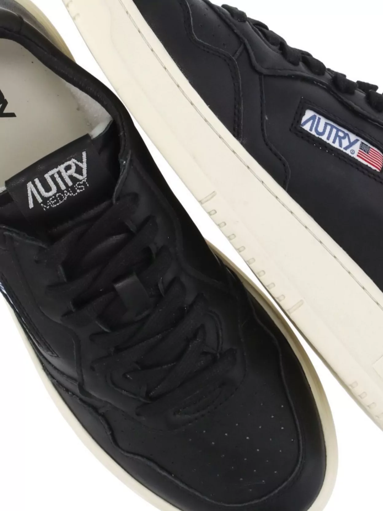 Autry Low Top Leather Sneakers With Perforated Toe
