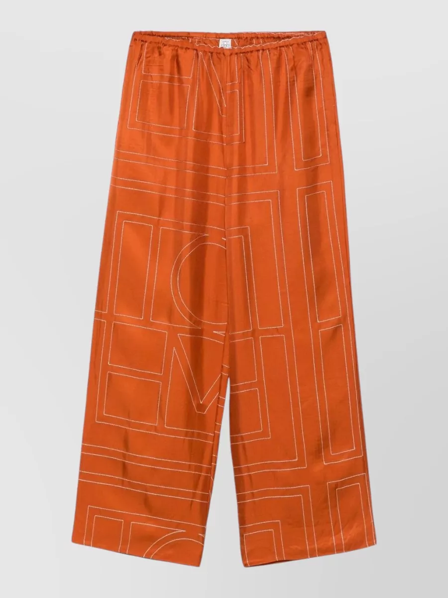 Totême Silk Monogram Wide-Leg Trousers