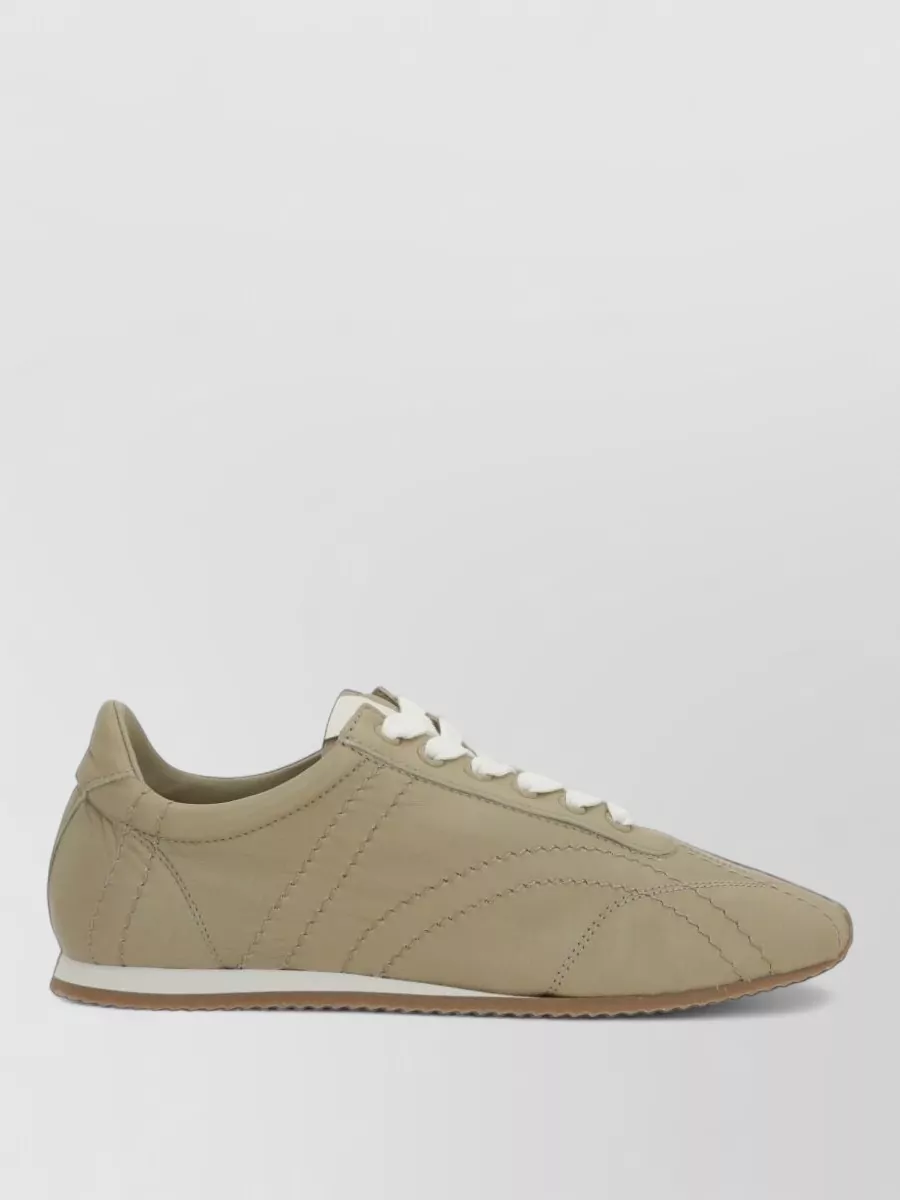 Totême leather lace-up sneakers