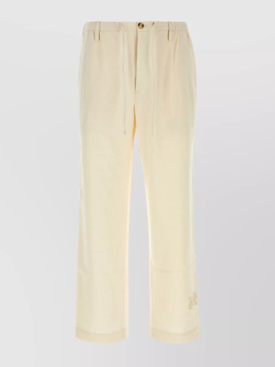 Shop Nanushka Wide-leg Viscose Blend Trousers With Embroidered Accents In Cream