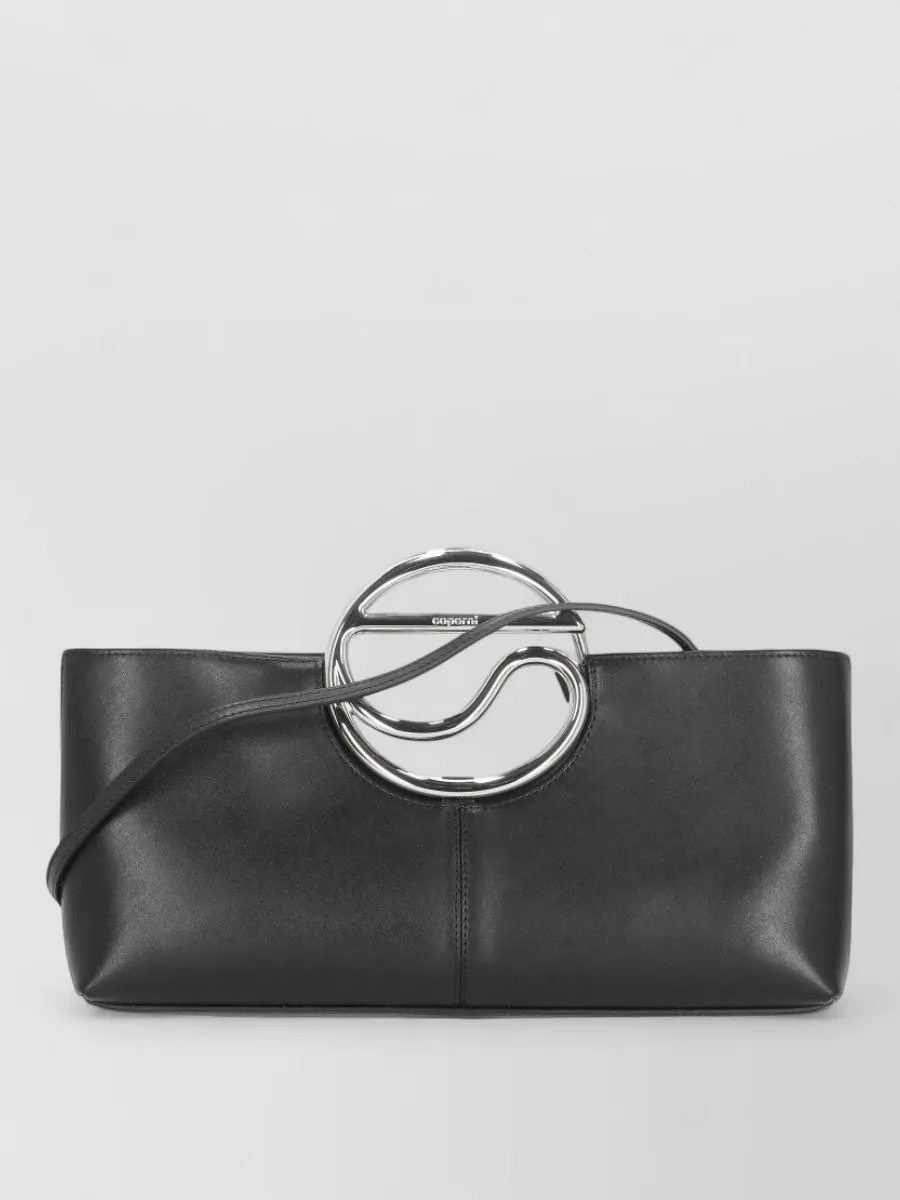 Coperni c purse leather shoulder bag — Totême’s slim black croc‑embossed clutch echoes the dress’s sleek, architectural mood with subtle texture, staying compact and structured so it never distracts from the peplum column shape.