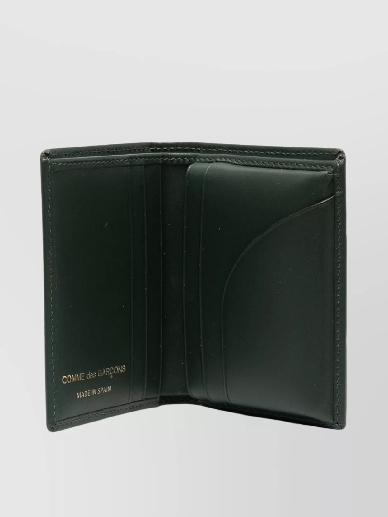 Comme Des Garçons Compact Bi-Fold Wallet Design