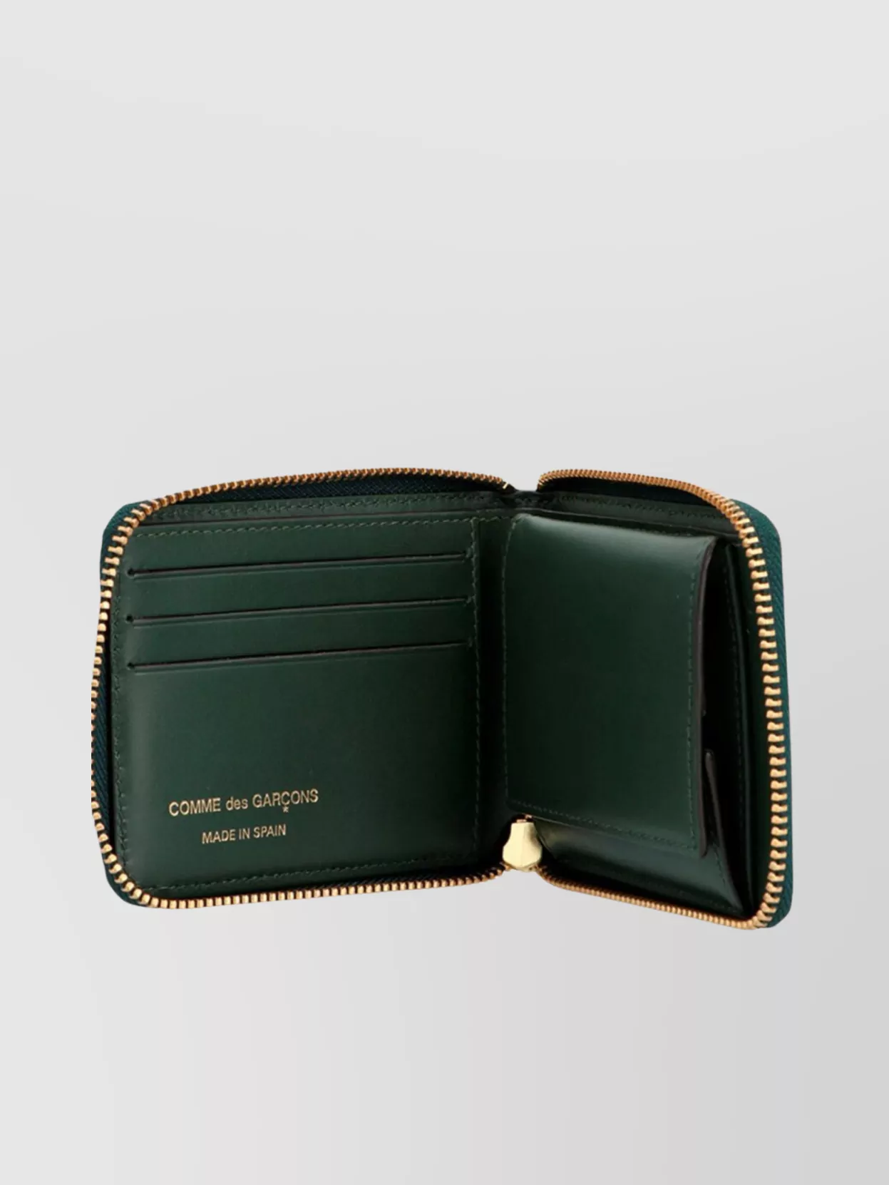 COMME DES GARÇONS STREAMLINED LEATHER WALLET LINE