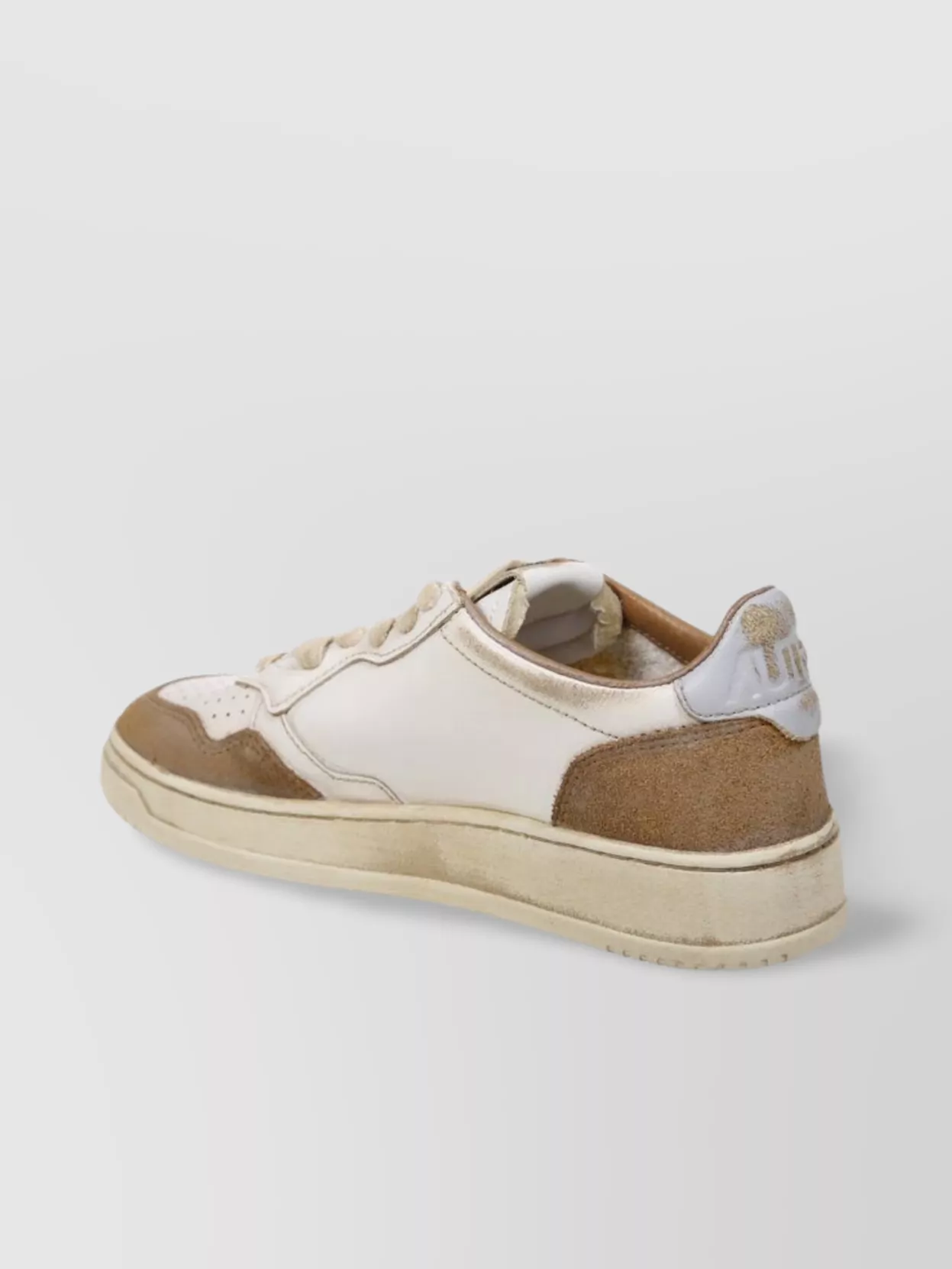 Autry Low Sneaker With Perforated Detailing And Contrast Panel