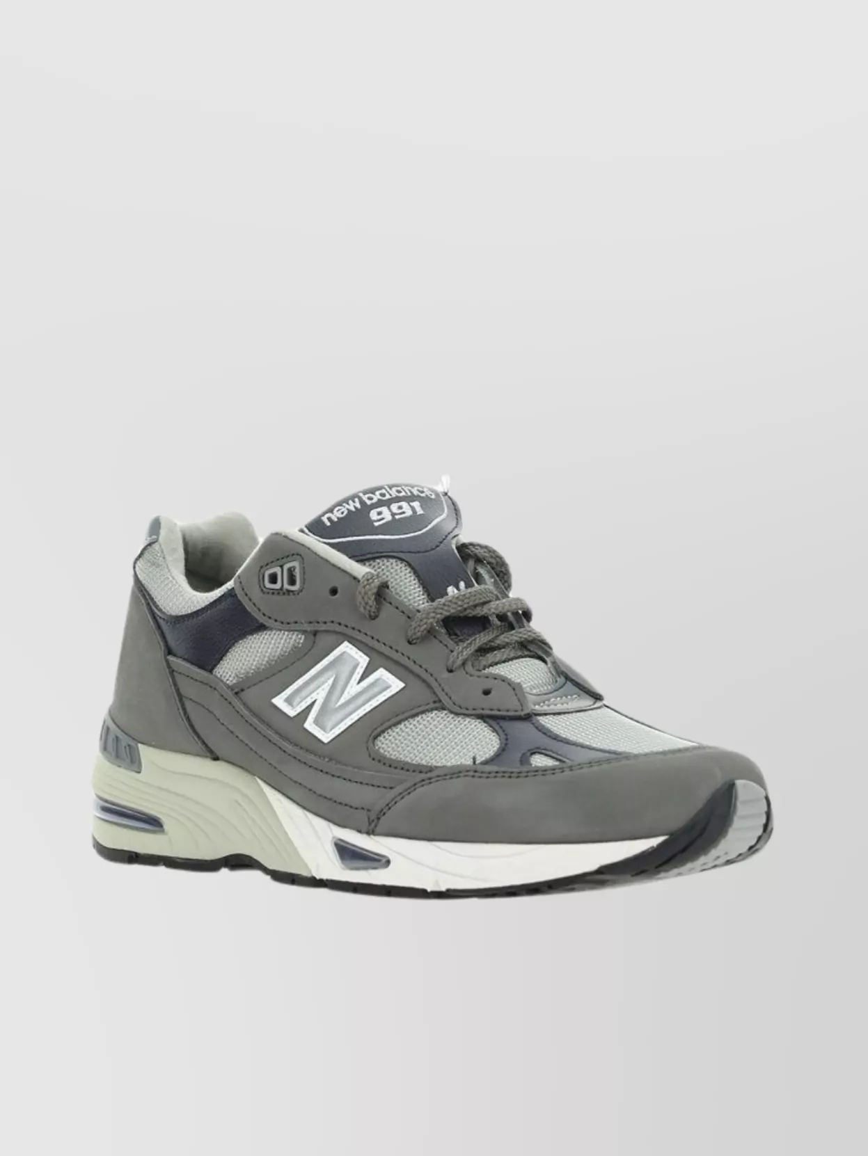 Shop New Balance 991 Sneakers With Color Block Design