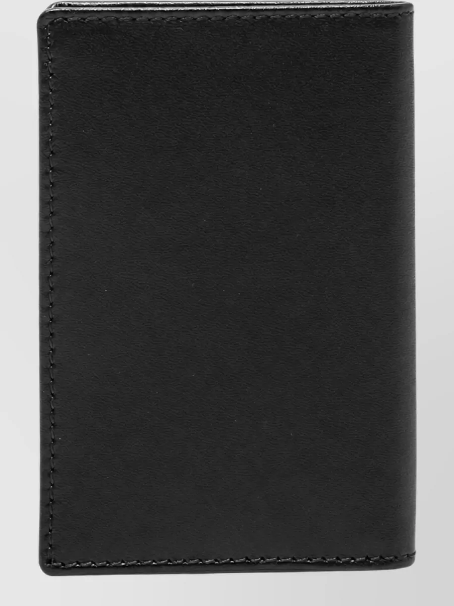Comme des Garçons leather wallet