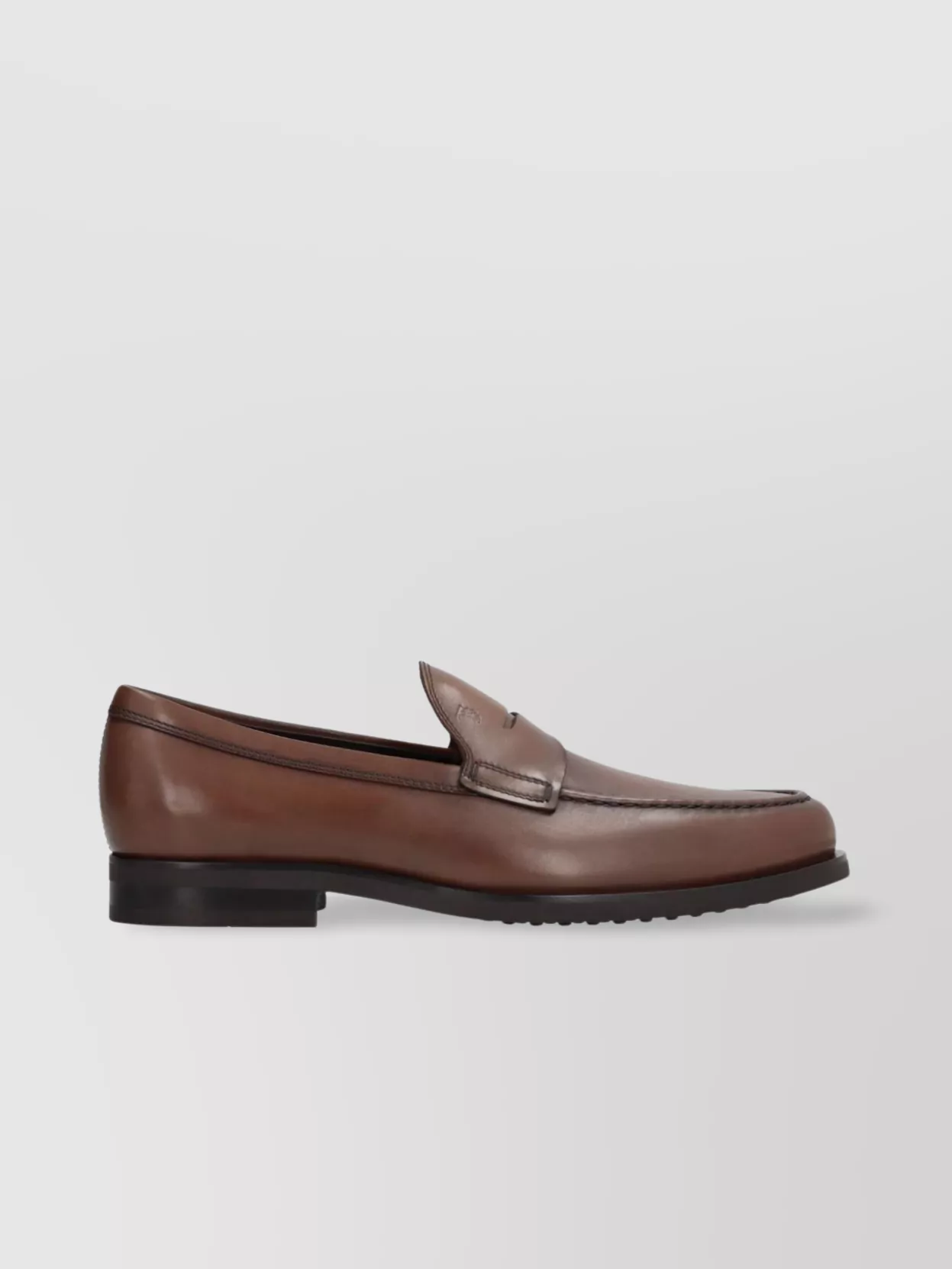 Tod's Round Toe Leather Loafer With Rubber Sole