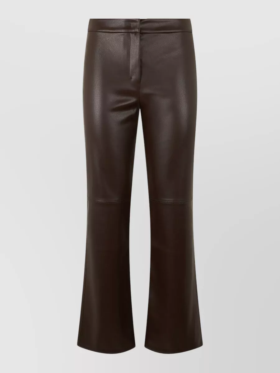 S Max Mara Faux leather high-rise flared trousers — The dark chocolate high-rise flared trouser from S Max Mara mirrors the shirt’s warm browns, adds a slightly retro tailored line, and keeps the romantic ruffles feeling polished rather than twee.