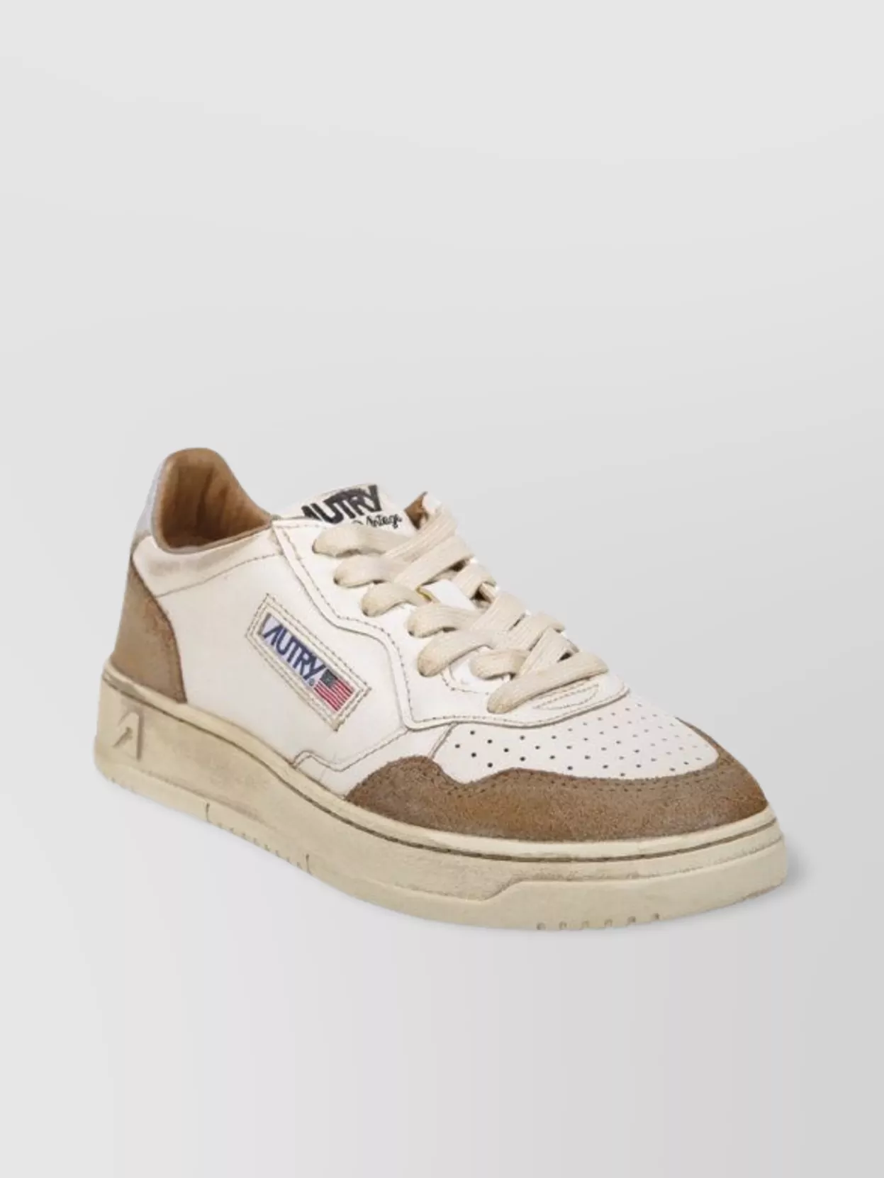 Autry Low Sneaker With Perforated Detailing And Contrast Panel