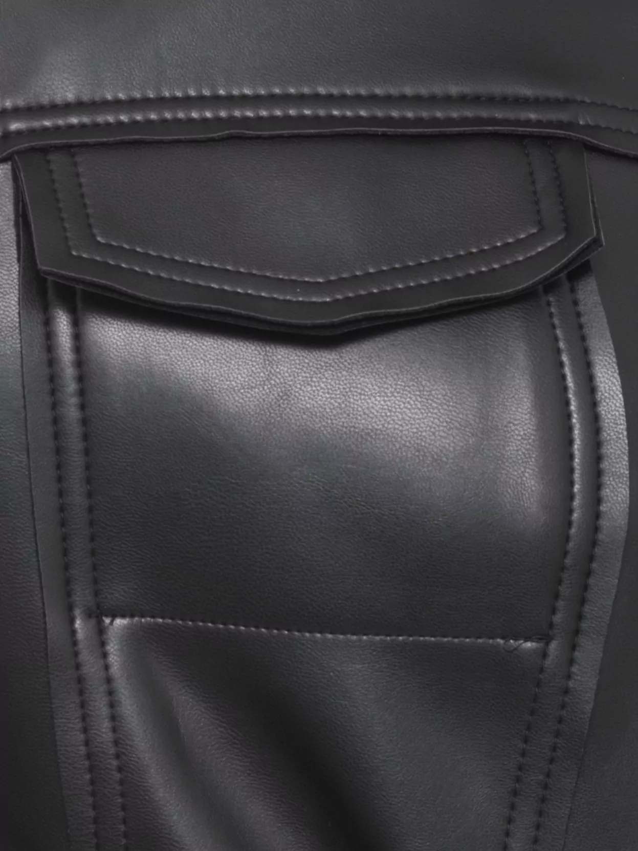 Norma Kamali Fitted Synthetic Leather Long Sleeve Jacket In Black