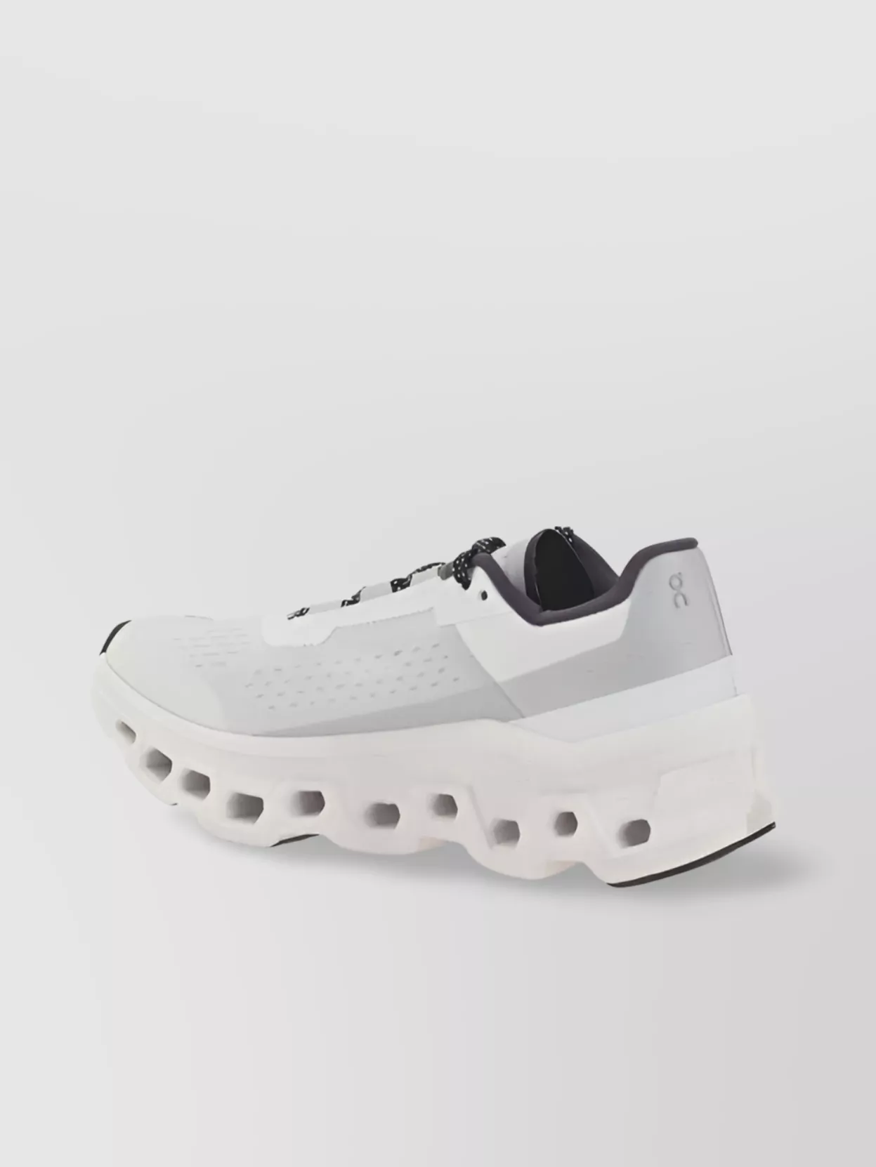 On Cloudmonster Perforated Sole Sneakers
