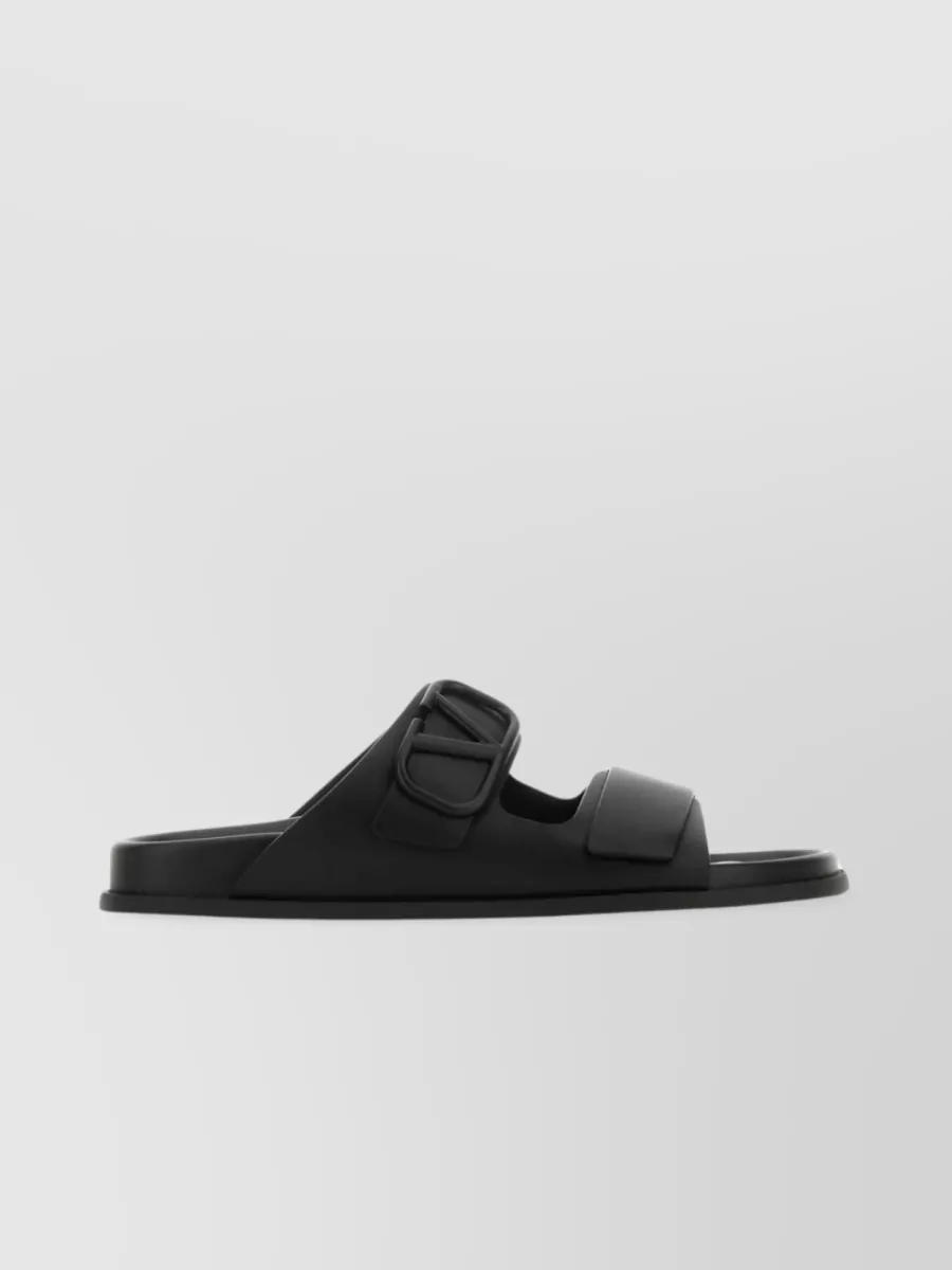 Shop Valentino Flat Sole Leather Vlogo Slippers In Black