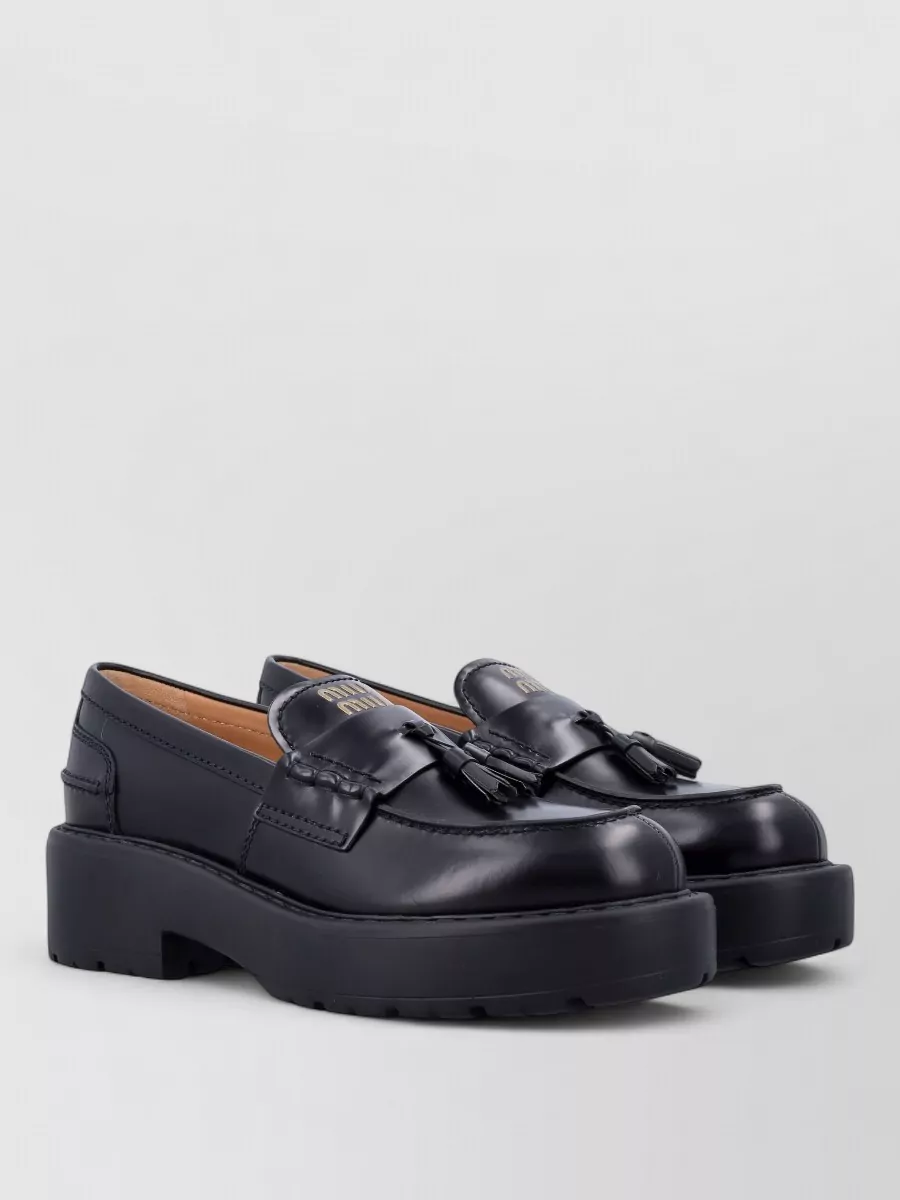 Miu Miu leather platform tassel loafers