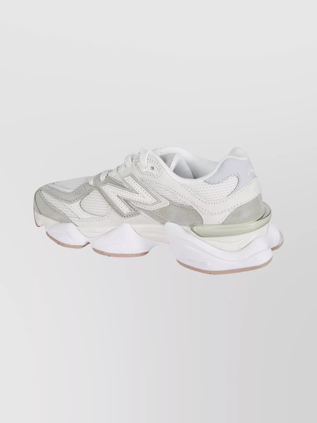 New Balance Logo Embossed Leather Sneaker Featuring Mesh Panels