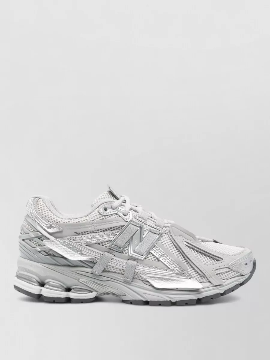 New Balance paneled low-top sneakers