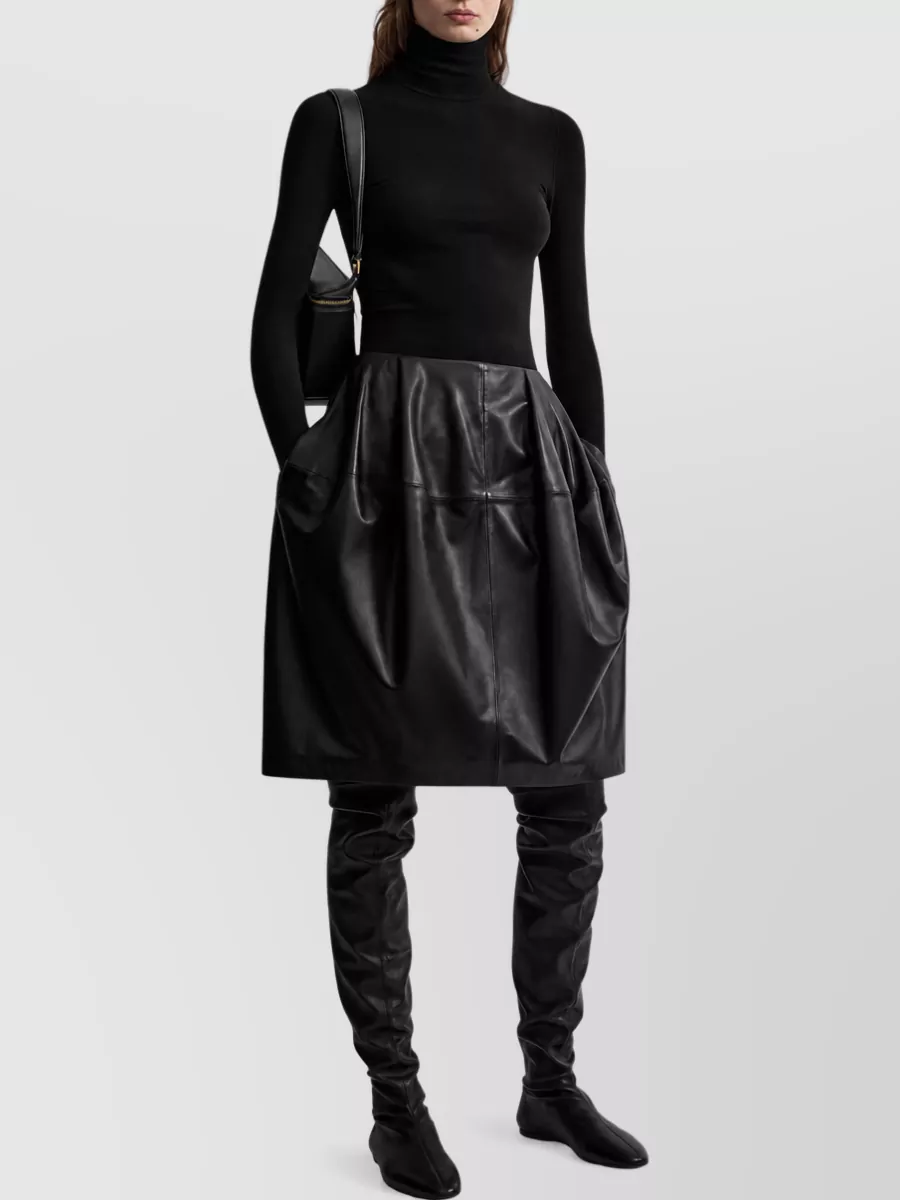 Totême Turtleneck Sweater