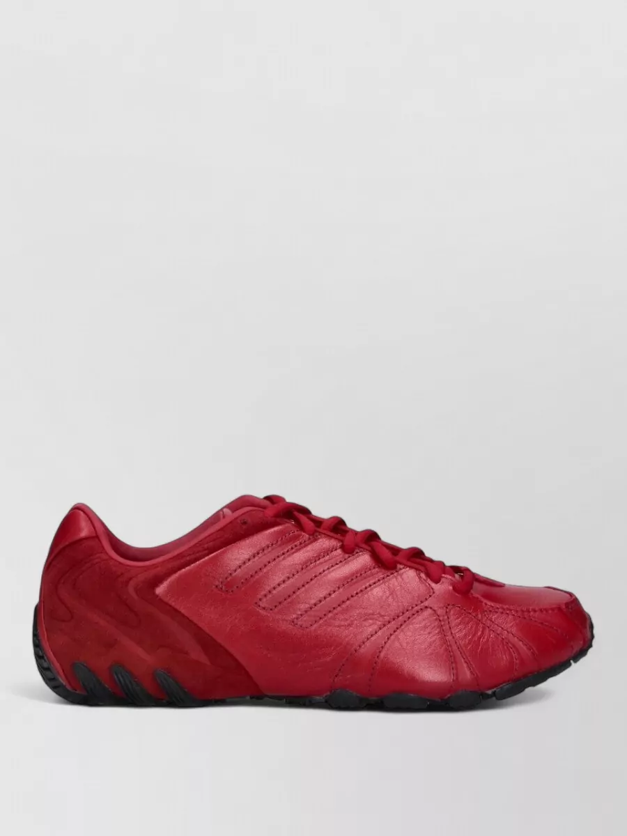 Adidas leather low top lace-up sneakers