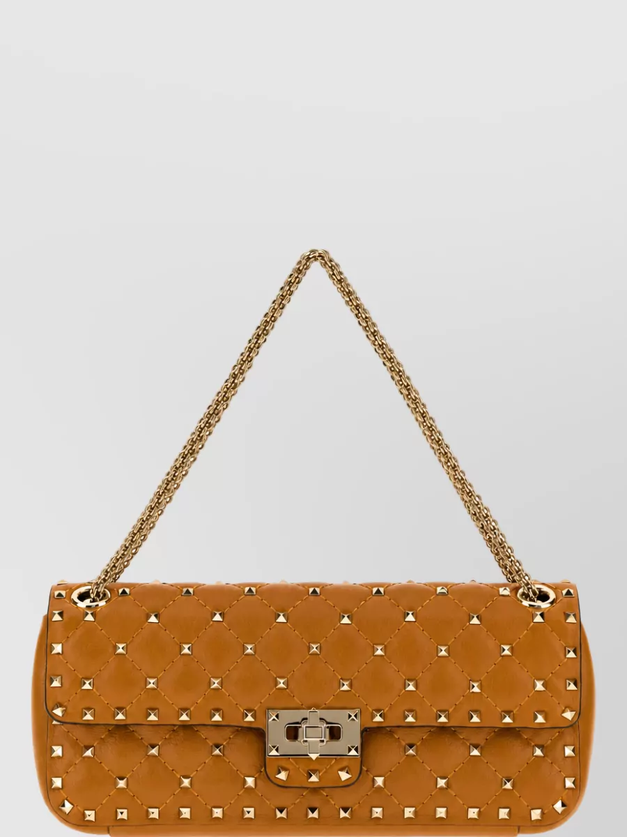Valentino Garavani rockstud spike medium leather clutch bag