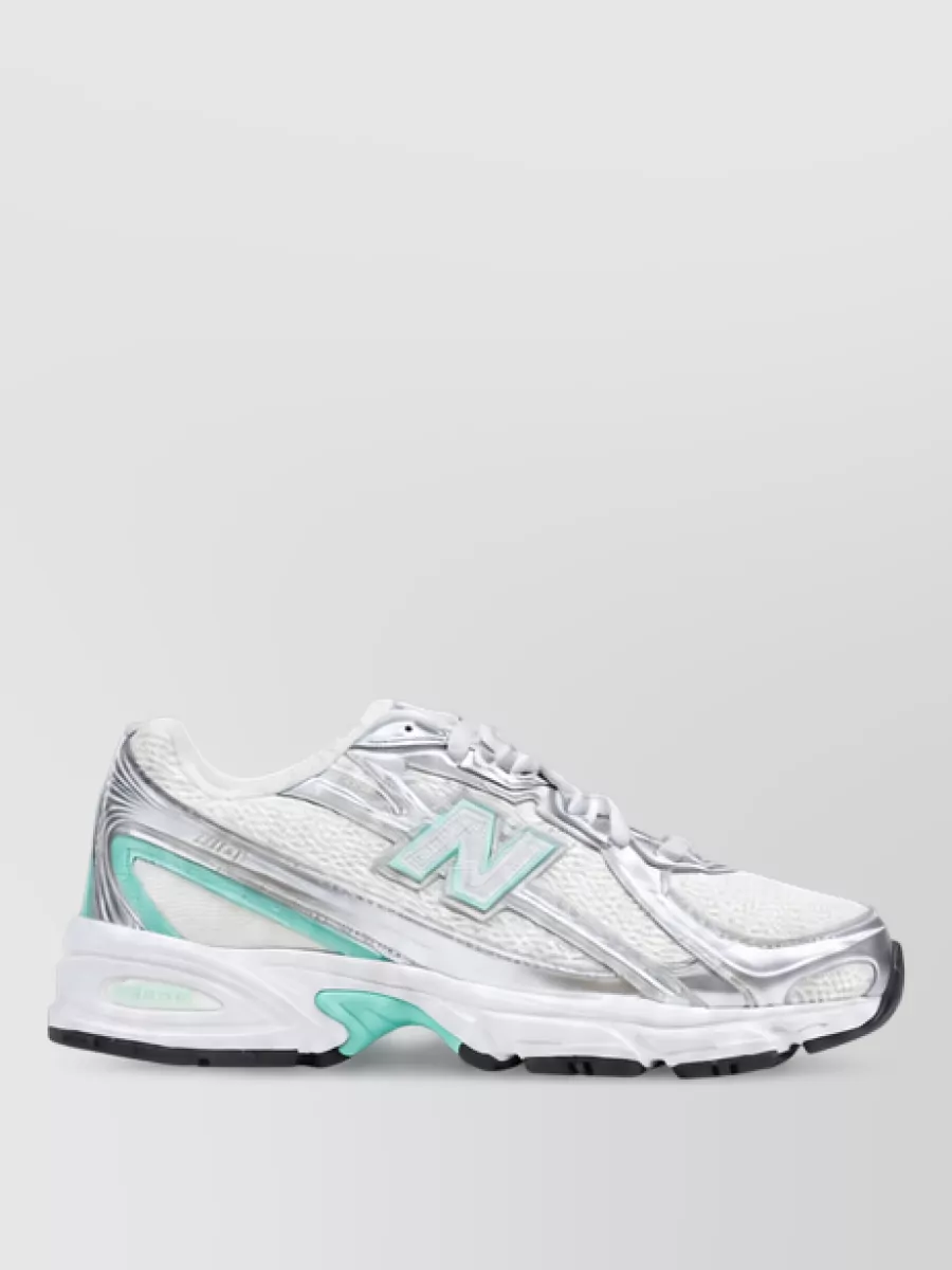 New Balance silver low-top sneakers