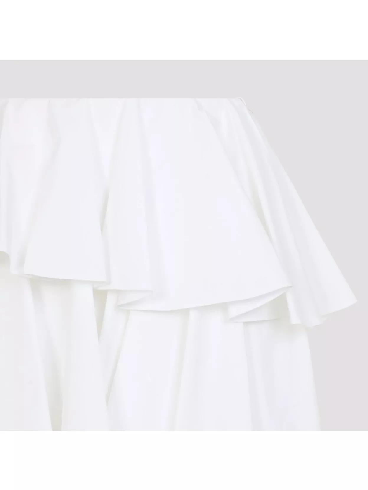 Shop Alaïa Spiral Mini Skirt Asymmetric Hem