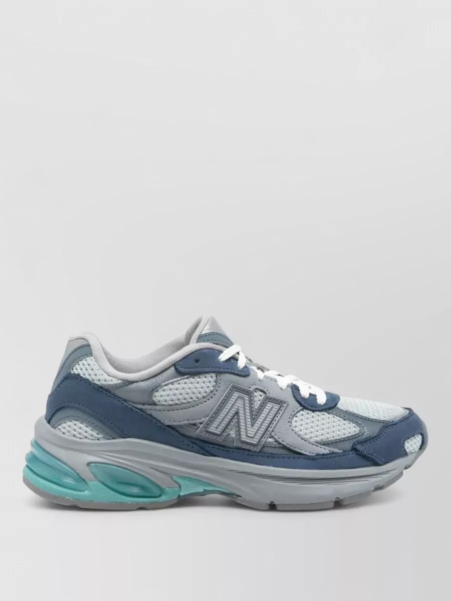 New Balance Paneled Low-Top Sneakers