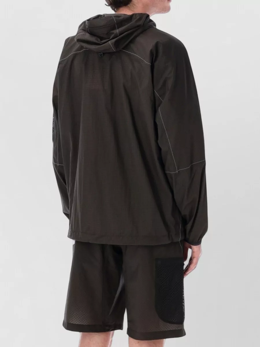 And Wander Nylon Hooded Jacket