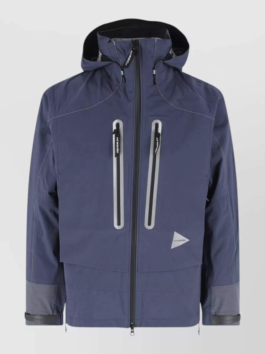 And Wander raincoat