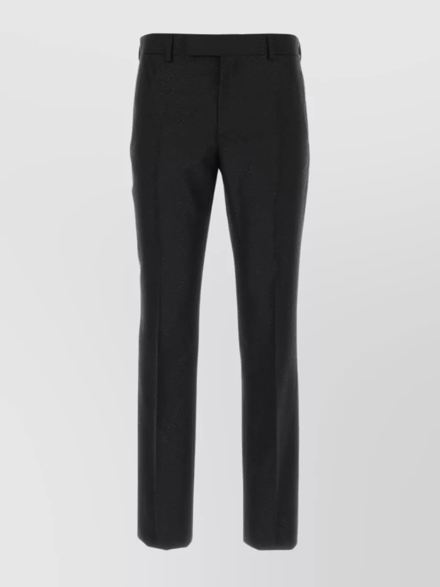 Shop Versace La Greca Refined Wool Blend Trousers In Black